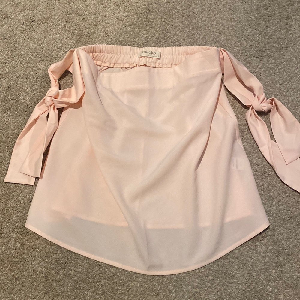 Super cute off the shoulder tie sleeve shirt